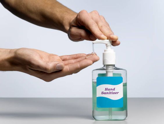 buy and girl Using Hand Sanitizer 