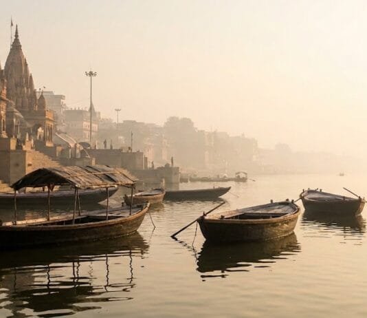 I Didn’t Just Visit Varanasi. I Lived It. Sunrise over the ghats of Varanasi along the River Ganga